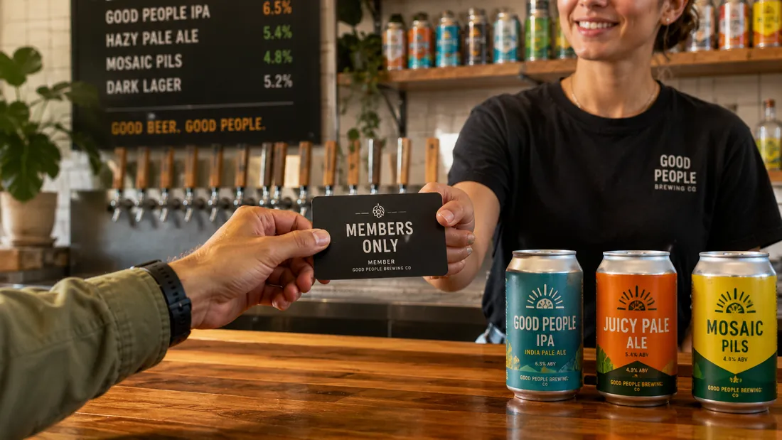 A Members Only card handed across a counter at a brewery taproom